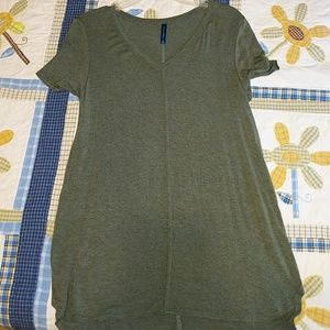 Green tunic length style T shirt.